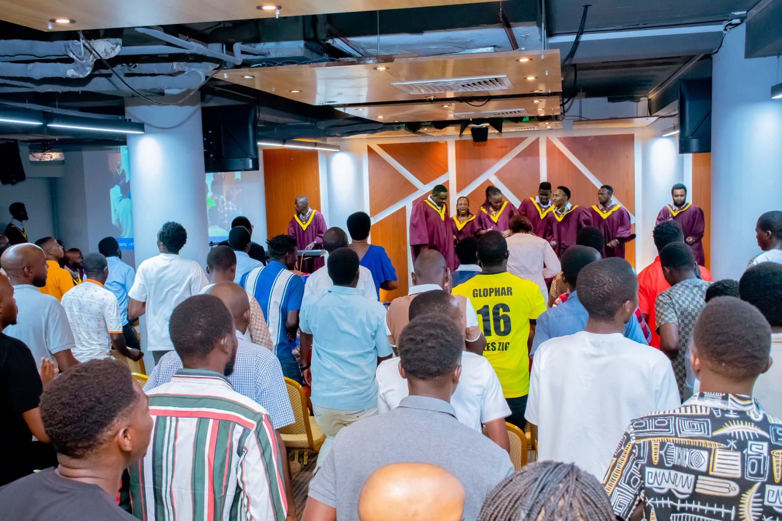The choir leading worship in front of the church congregation